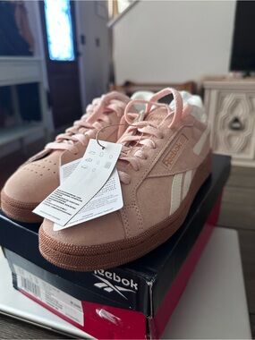 Reebok Pink Suede Low-Top Sneakers with White Stripes